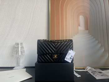 Chanel flap bag lambskin black gold chain 25.5cm