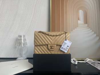 Chanel flap bag lambskin brown gold chain 25.5cm