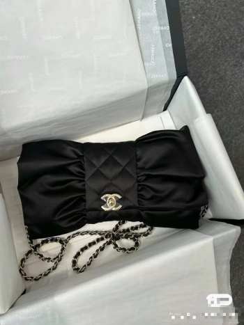 Chanel satin bow in black bag