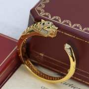 Cartier gold-plated bracelets with leopard heads - 1