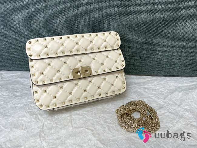 Valentino studded leather crossbody bag in white - 1