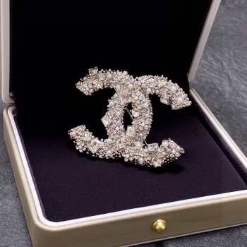 Chanel diamond brooches