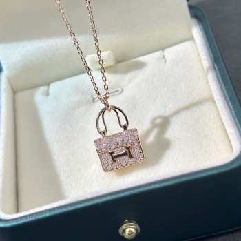 Hermes Amulettes Kelly pendant necklace