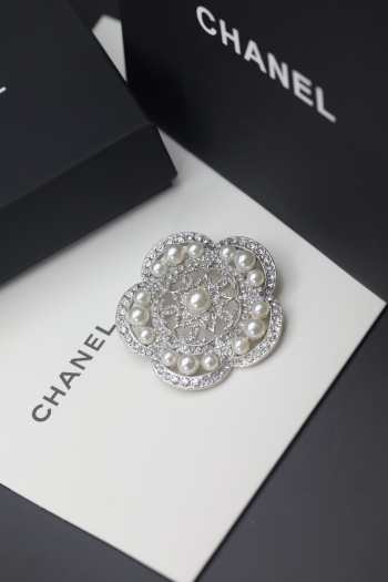 Chanel camellia brooch