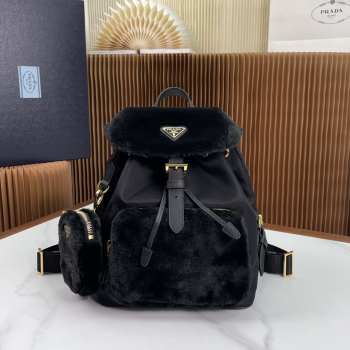 Prada re-nylon and shearling backpack in black 25x20x11cm