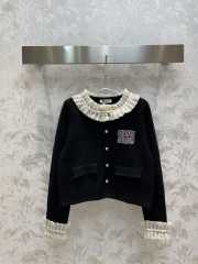 Miu Miu knitted cardigan in black - 1