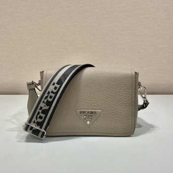 Prada soft leather bag with the lettering logo on the flap in beige 23x15.5x9cm