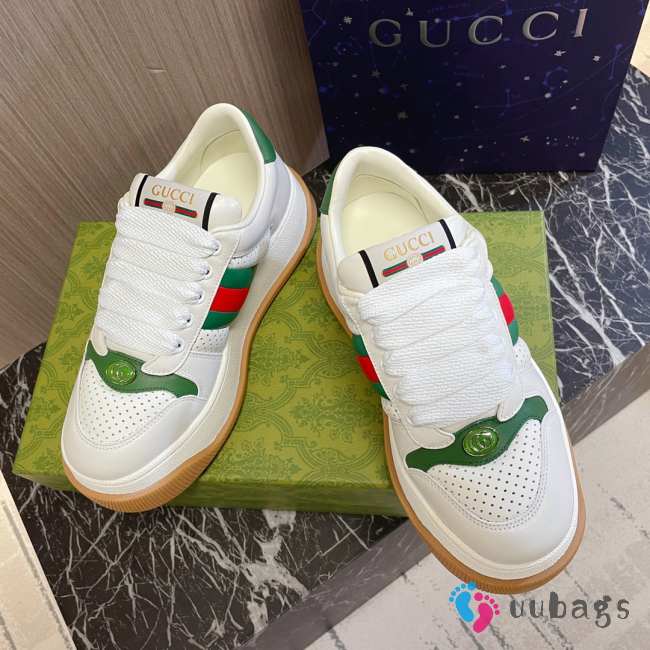 Gucci women Screener Sneaker with white GG canvas green and white padded leather - 1