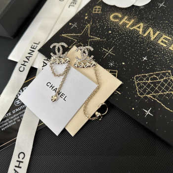 Chanel silver earrings with diamond