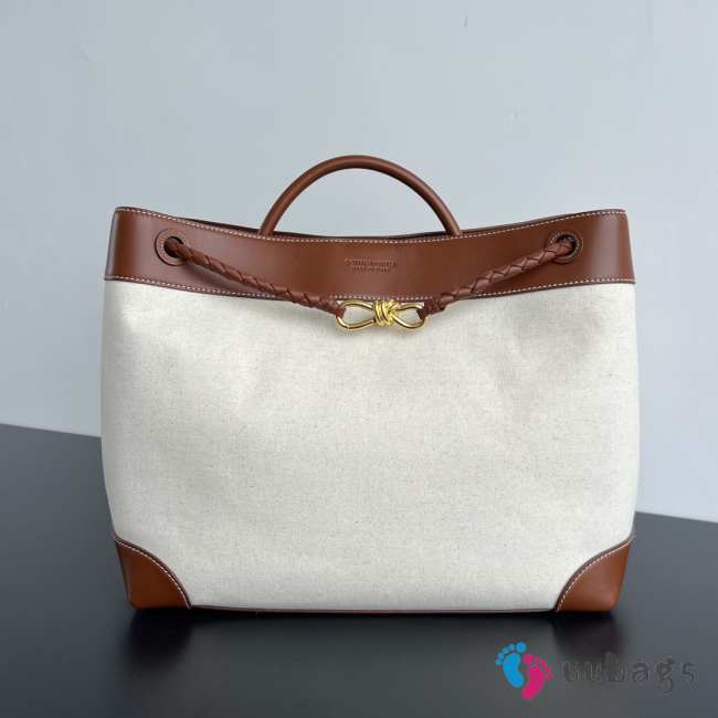 Uubags | Andiamo top handle bag in weathered leather and canvas with signature knot - 1