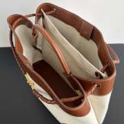 Uubags | Andiamo top handle bag in weathered leather and canvas with signature knot - 4