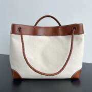 Uubags | Andiamo top handle bag in weathered leather and canvas with signature knot - 5