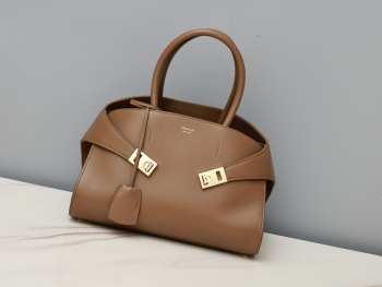 Uubags | Ferragamo Hug bag in brown 31.5x19x22cm