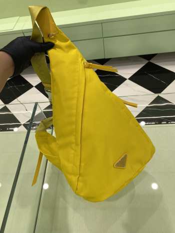 Uubags | Sea Beyond Re-Nylon and leather backpack in yellow 37.5x26.5cm