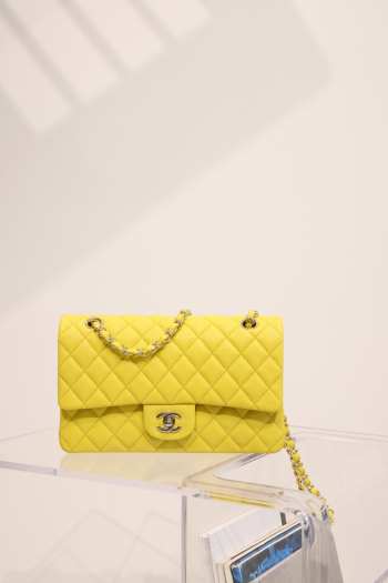 Chanel flap bag medium in yellow caviar leather with light gold buckle 25cm