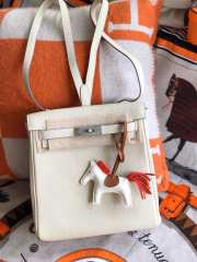 Uubags | Hermes Kelly Ado leather Togo backpack in white with silver buckle 22cm - 1