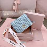 Uubags | Miu Miu small matelassé nappa leather wallet in light blue 11.2x8.5cm - 1