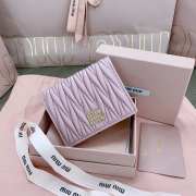 Uubags | Miu Miu small matelassé nappa leather wallet in light pink 11.2x8.5cm - 1