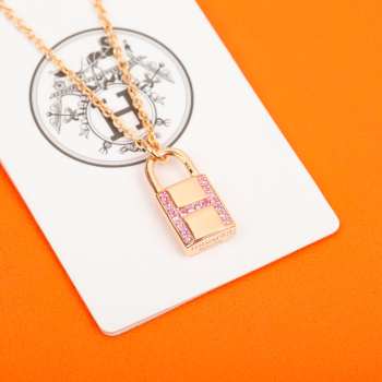 Uubags | Hermes Kelly Cadenas Pendant in rose gold and pink sapphire gemstones with Kelly snap closure