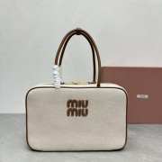 Uubags | Miu Miu Canvas top-handle bag with leather handles 20x34x10cm - 1