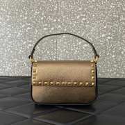 Uubags | Valentino Garavani small leather Rockstud top handle bag in gold metallic grainy calfskin 19x12x3cm - 1