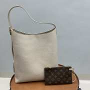 Uubags | Louis Vuitton M25022 Low Key Hobo MM Bag In White 31x35x18cm - 1