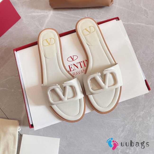 Uubags | Valentino Garavani VLogo cut-out slide sandal in white calfskin leather - 1