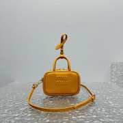 Uubags | Miu Miu leather micro bag in yellow 10.5x4cm - 1