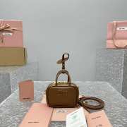 Uubags | MiuMiu leather micro bag in brown 10.5x4cm - 1