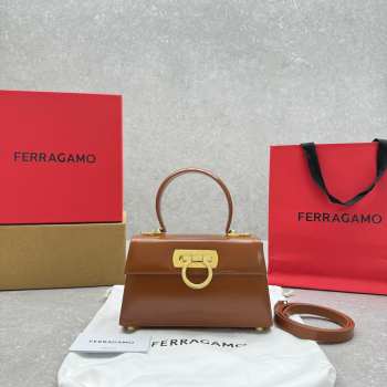 Uubags | Ferragamo Iconic top handle brown bag in brushed-off calfskin with a gold Gancini clasp 21x8x12cm