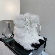 Uubags | Chanel 21K White/Black Shearling Sheepskin Fur Boots - 1