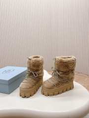 Uubags | Prada Apres Ski Shearling Boots In Beige - 1