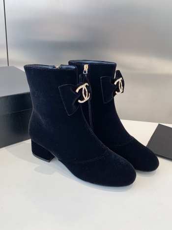 Uubags | Chanel suede ankle boots with tie bow in black 