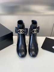 Uubags | Chanel calfskin ankle boots with tie bow in black - 6