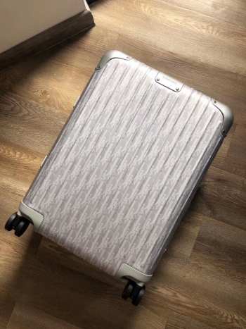 Uubags | Dior And Rimowa carry-on luggage in grey 55x40x23cm