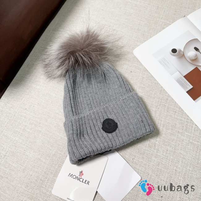 Uubags | Moncler wool pom pom beanie in grey - 1