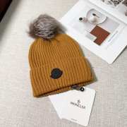 Uubags | Moncler wool pom pom beanie in brown - 1