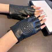 Uubags | Gucci anti-slip fingerless gloves in black - 1