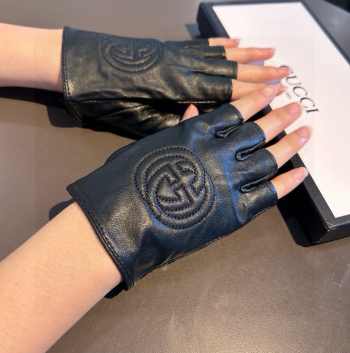 Uubags | Gucci anti-slip fingerless gloves in black