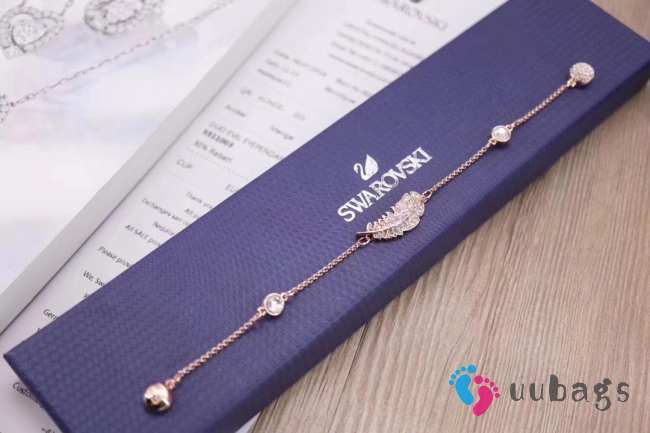 Uubags | Swarovski rose-gold tone plated feather strand bracelet - 1