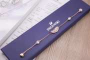 Uubags | Swarovski rose-gold tone plated feather strand bracelet - 1