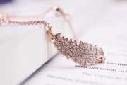 Uubags | Swarovski rose-gold tone plated feather strand bracelet - 6