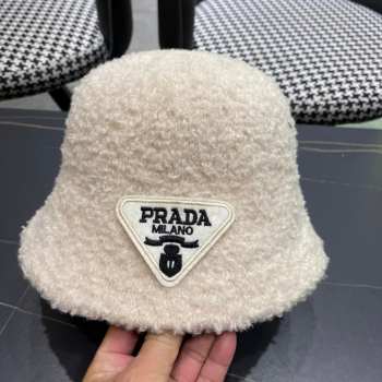 Uubags | Prada fur bucket hat in beige