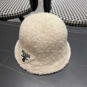 Uubags | Prada fur bucket hat in beige - 4