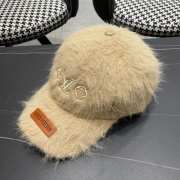 Uubags | Louis Vuitton fur cap in beige - 1