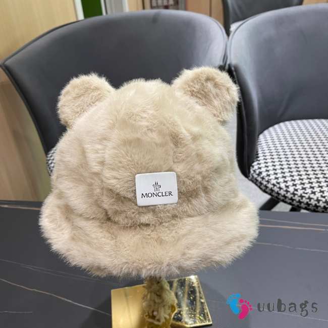 Uubags | Moncler bucket hat with bear ears decoration in beige - 1