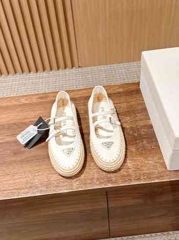 Uubags Prada nappa leather and raffia ballerinas in ivory
