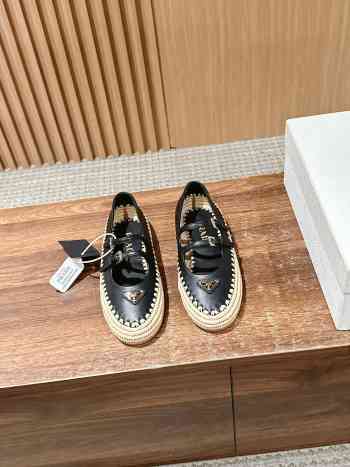 Uubags Prada nappa leather and raffia ballerinas in black