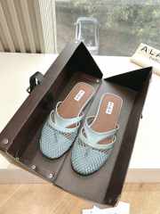 Uubags Alaïa Infradito Flat Mules In Fishnet And Leather Light Blue - 4