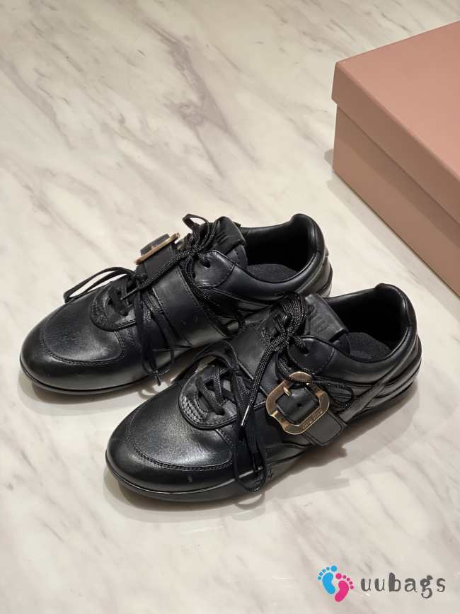 Uubags Miu Miu leather sneakers with buckle in black - 1